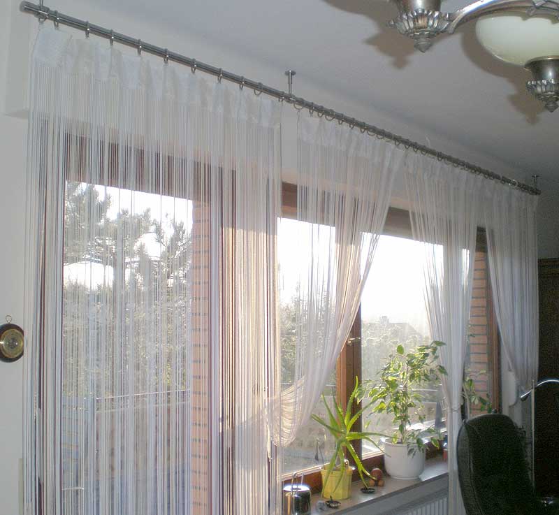 Blinds boxes don't allow wall mounting, but you can also mount the curtain rods on the ceiling.