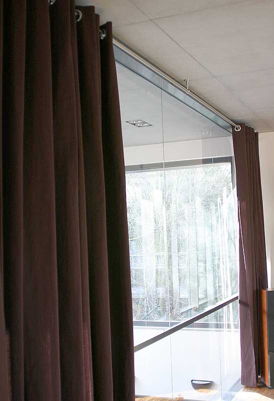 Single-track curtain rods for ceiling mounting