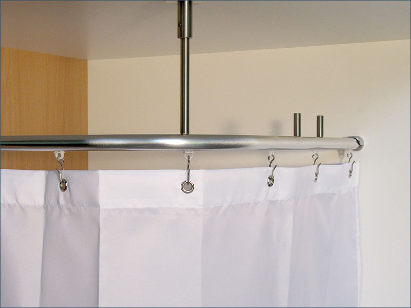 Hooks neatly on the shower curtain rod