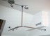 Shower curtain rod for sloped mounting, joint system for roof slope and wall slope